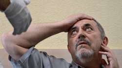 One anti-war critic fined, another held as Russia clamps down on dissent