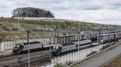 Bus hits train stopped on French side of Channel Tunnel, with 19 injured