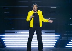 Lionel Richie rushed to hospital after falling ill on stage