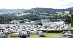 Police swarm Wales caravan park as man's death 'treated as unexplained'