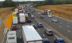 M25 traffic LIVE: Major motorway shuts in Surrey after two-lorry crash - 80-minute delays