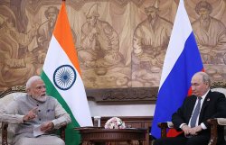 Awkward moment Putin is told to 'move on from endless war' during Modi meeting